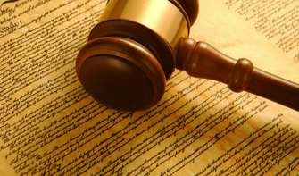 Image of a resolution and a gavel.